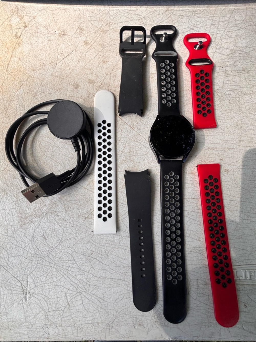 Samsung watch 6 40 mm , Interchangeable Red, White & Black bands